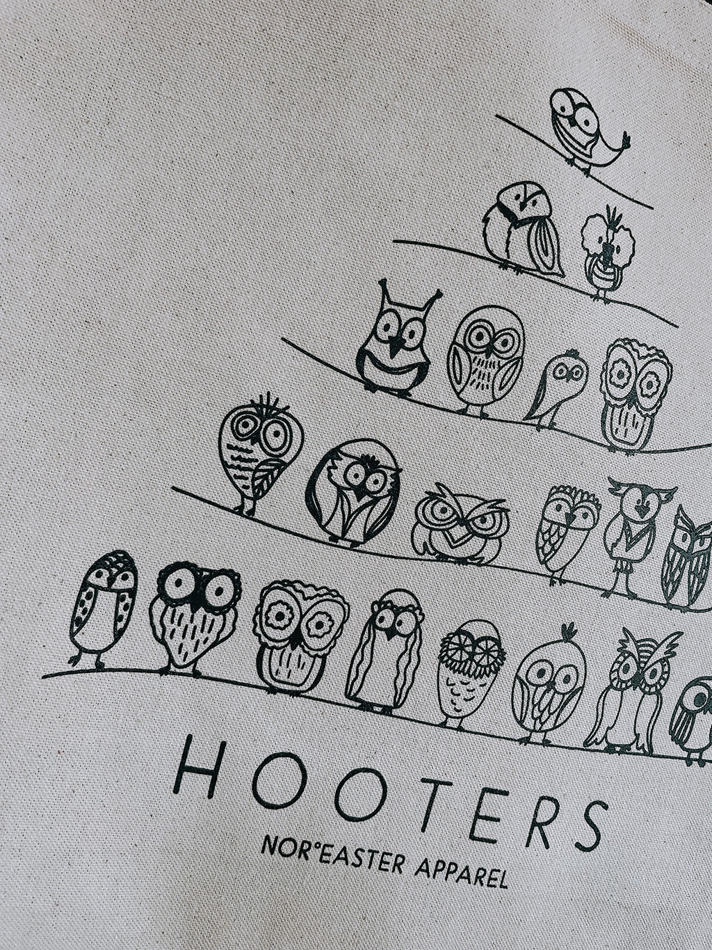 hooters tote bag detail of owls in black ink