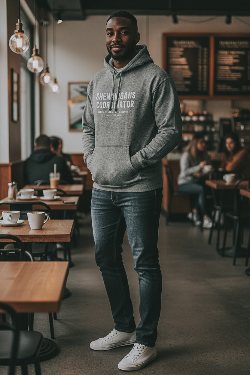 Shenanigans Coordinator Midweight Fleece Hoodie in grey with white ink on an african american man