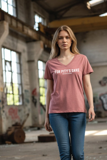 woman in a t-shirt standing in a warehouse for pitty's sake