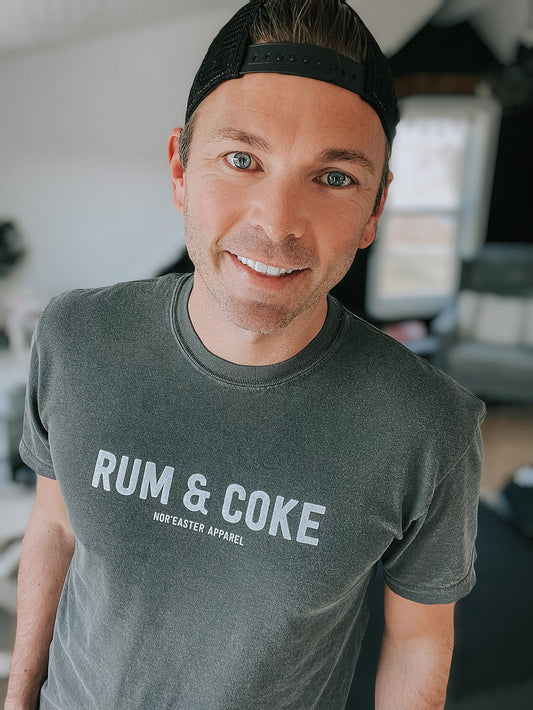 nor'easter apparel rum and coke t-shirt front view on a man